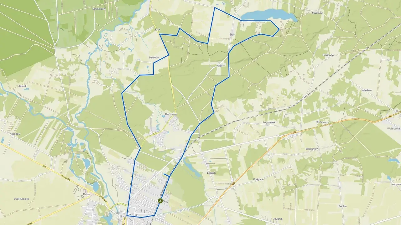 Mapa drogowa z zaznaczoną trasą wokół Gostynina. Widoczne są liczne drogi, pola, lasy i zbiorniki wodne.