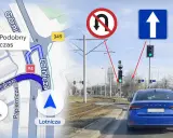 Nawigacja pokazuje trasę, a znaki i sygnalizacja świetlna ostrzegają przed mandatem za zawracanie na zakazie.