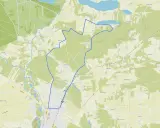 Mapa drogowa z zaznaczoną trasą wokół Gostynina. Widoczne są liczne drogi, pola, lasy i zbiorniki wodne.