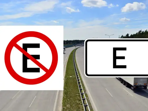 Zakaz zatrzymywania się (oznaczenie drogi E) i strefa dla pojazdów elektrycznych.