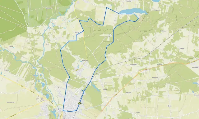 Mapa drogowa z zaznaczoną trasą wokół Gostynina. Widoczne są liczne drogi, pola, lasy i zbiorniki wodne.