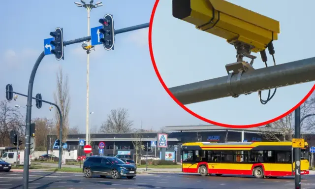 Żółte kamery na skrzyżowaniach rejestrują wykroczenia. Na zdjęciu widać skrzyżowanie z sygnalizacją świetlną, samochody i autobus.