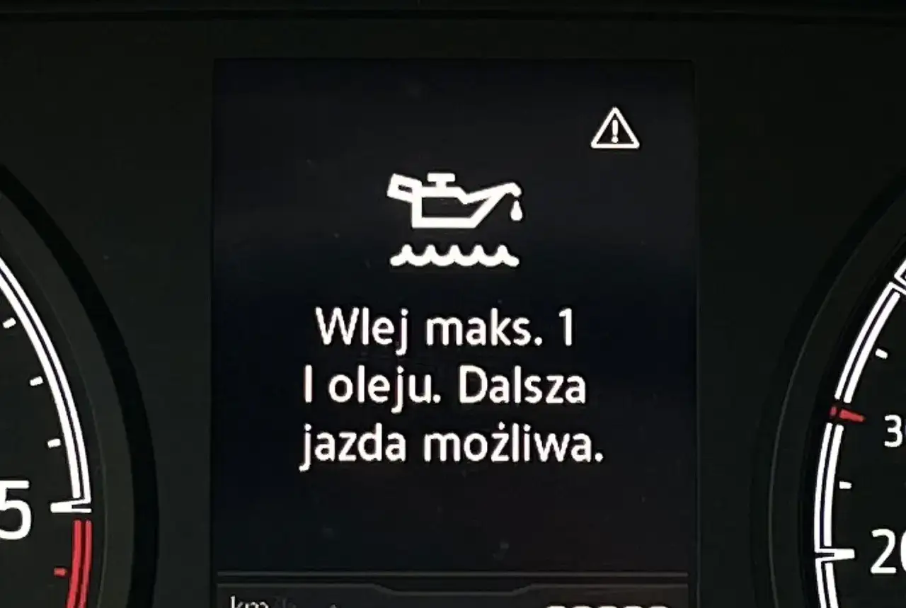 Kontrolka niskiego poziomu oleju: 