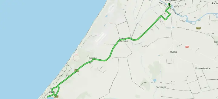 Trasa z Dąbków do Ustki przez Bobolin i Żukowo Morskie. Mapa pokazuje odległość i przebieg drogi.